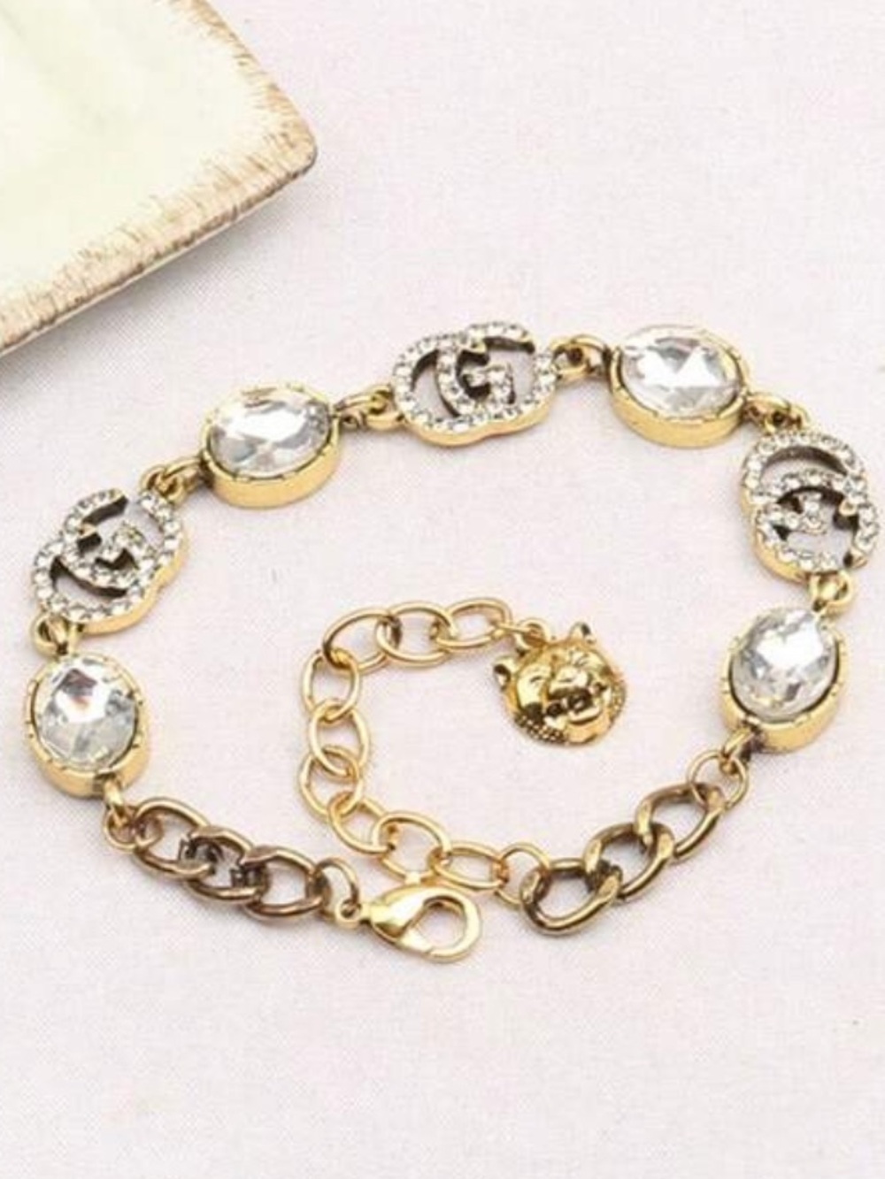 Gold To e and Clear Crystal Letter G Charm Bracelet